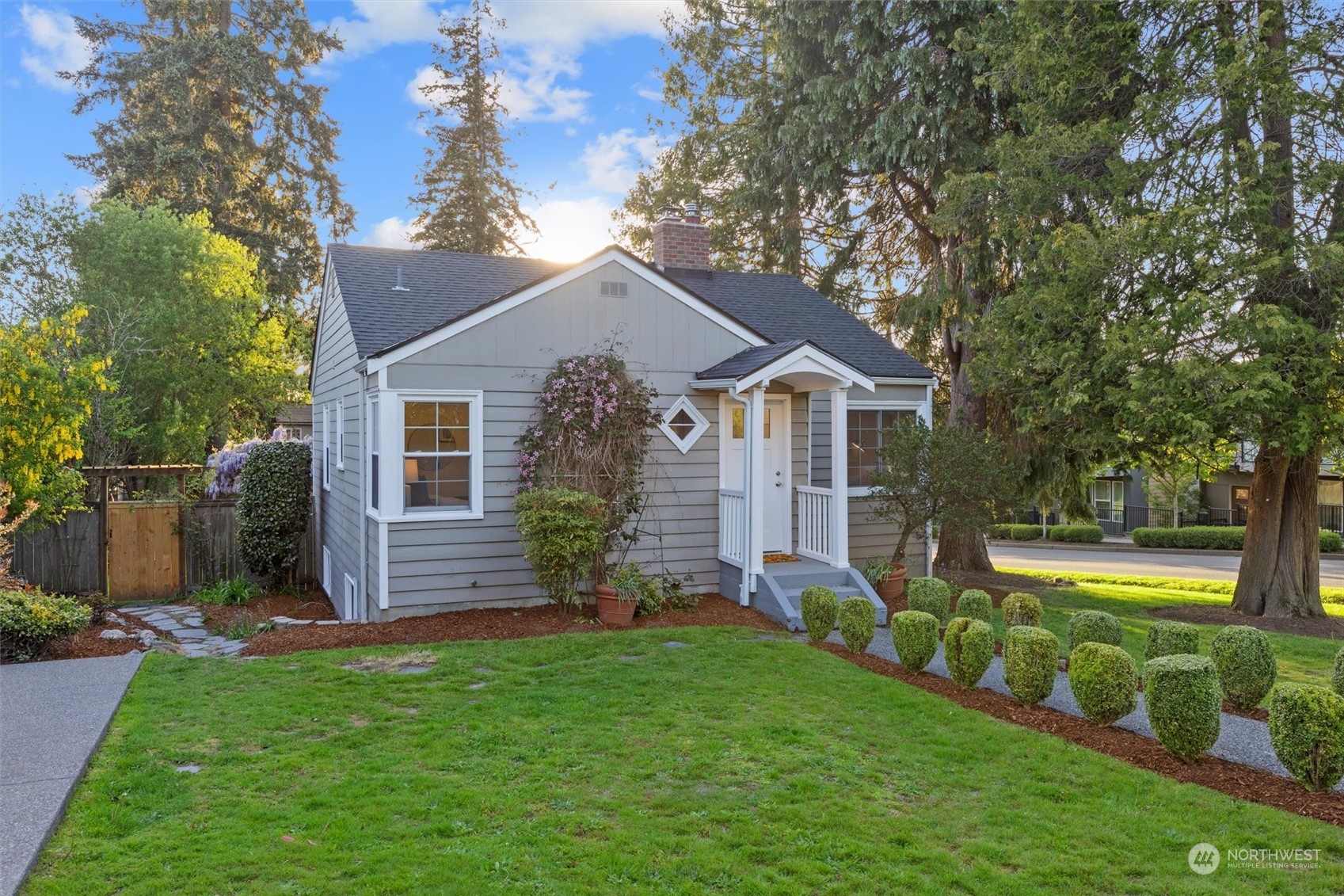 14357 36th Avenue Northeast Seattle, WA 98125 - Photo 2 of 23 a front view of a house with garden