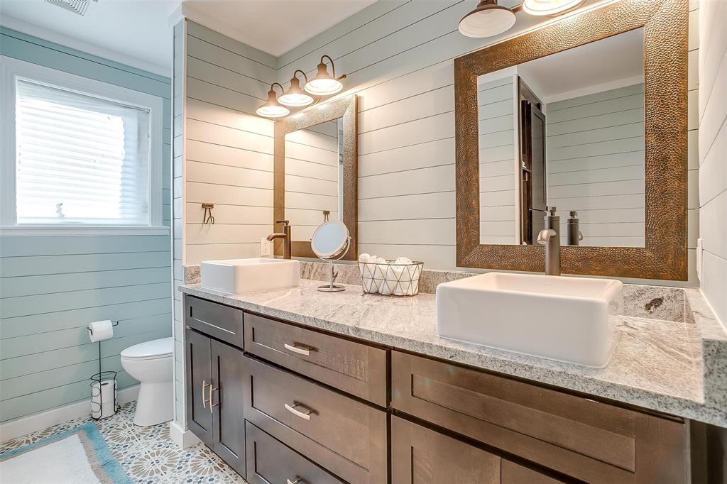 520 Deer Trail Gordon, TX 76453 - Photo 18 of 40 Full bath with wooden walls and double vanity