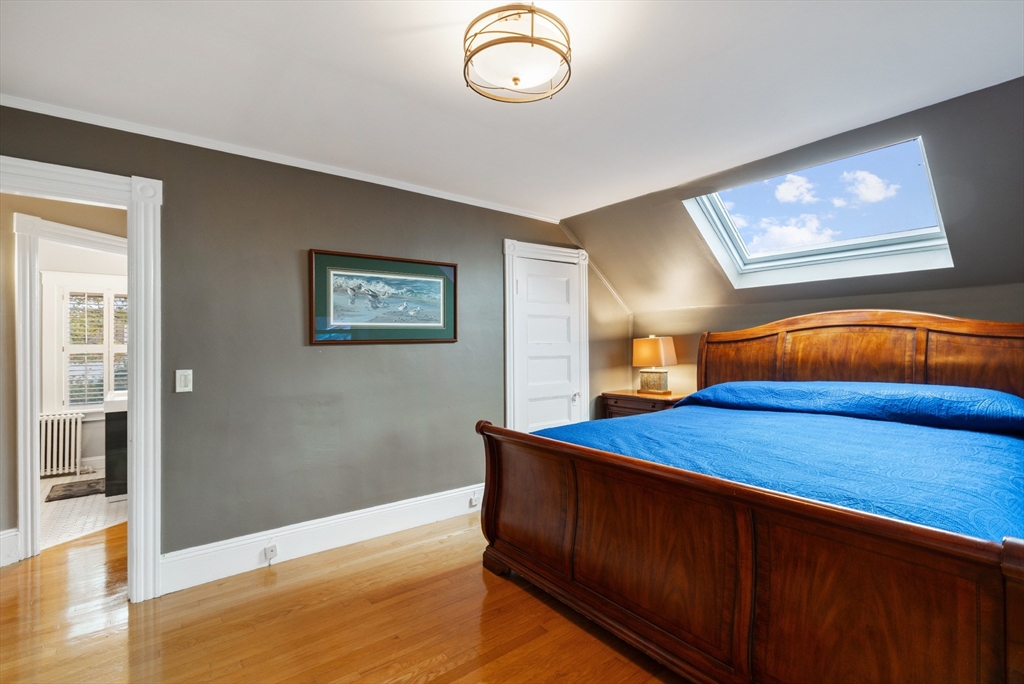 25 Curtis Street Marblehead, MA 01945 - Photo 15 of 28 a bedroom with bed and a window