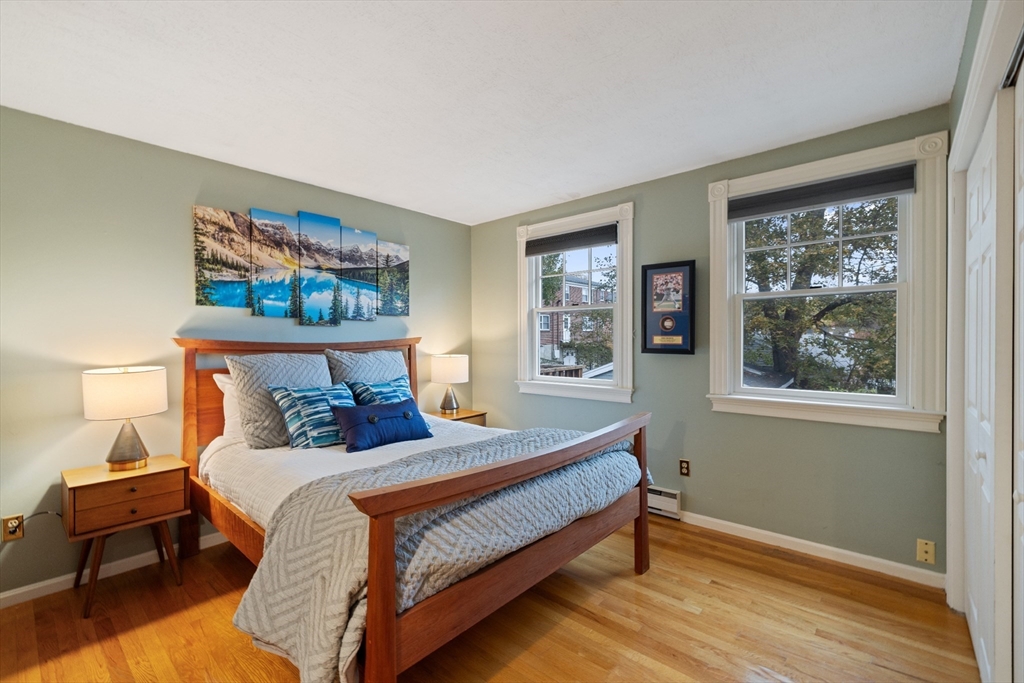 25 Curtis Street Marblehead, MA 01945 - Photo 18 of 28 a bedroom with a bed and a window