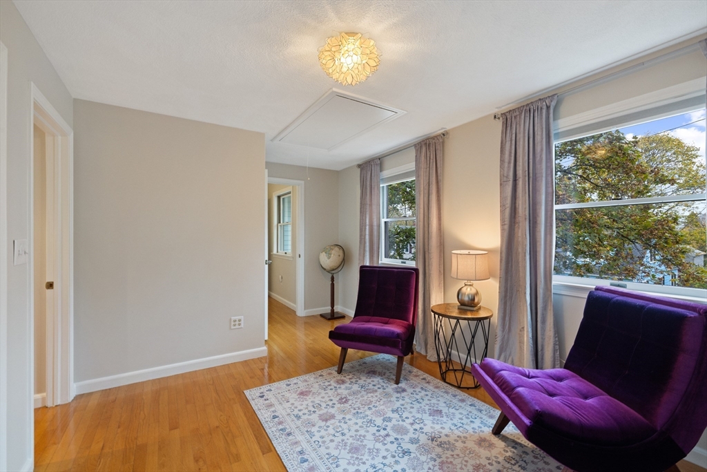 25 Curtis Street Marblehead, MA 01945 - Photo 19 of 28 a living room with furniture rug and a window