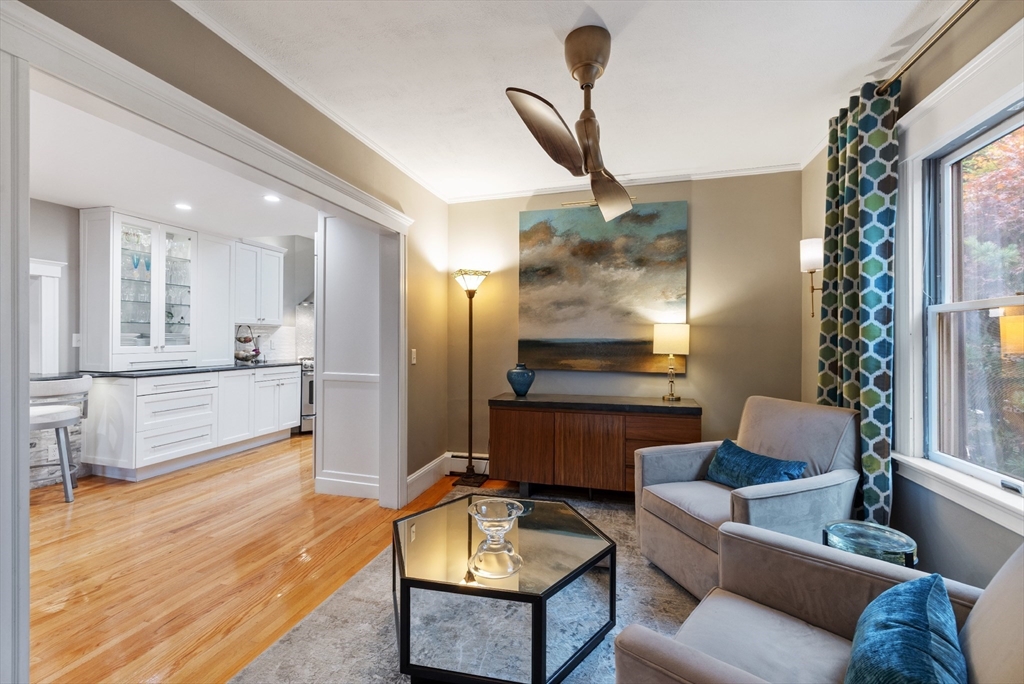 25 Curtis Street Marblehead, MA 01945 - Photo 8 of 28 a living room with furniture and a wooden floor