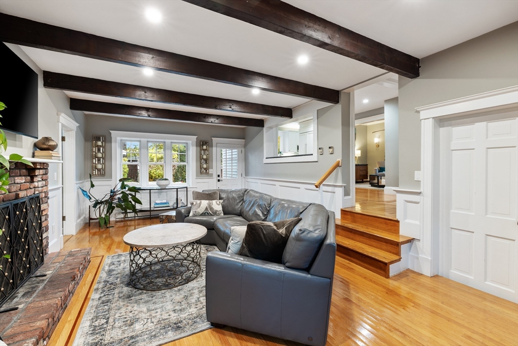 25 Curtis Street Marblehead, MA 01945 - Photo 9 of 28 a living room with furniture and a wooden floor
