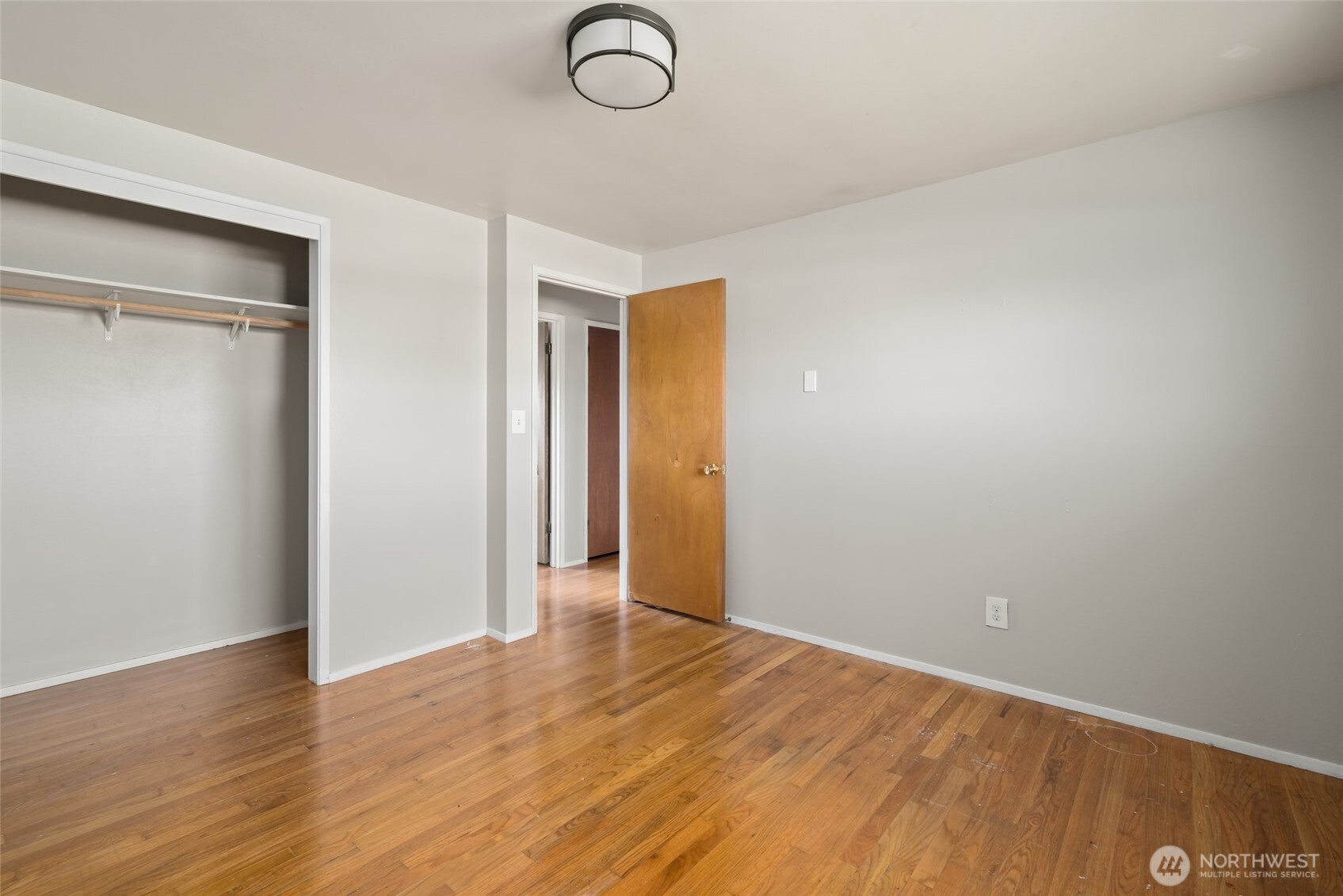 1805 37th Street Anacortes, WA 98221 - Photo 20 of 40 a view of an empty room with wooden floor