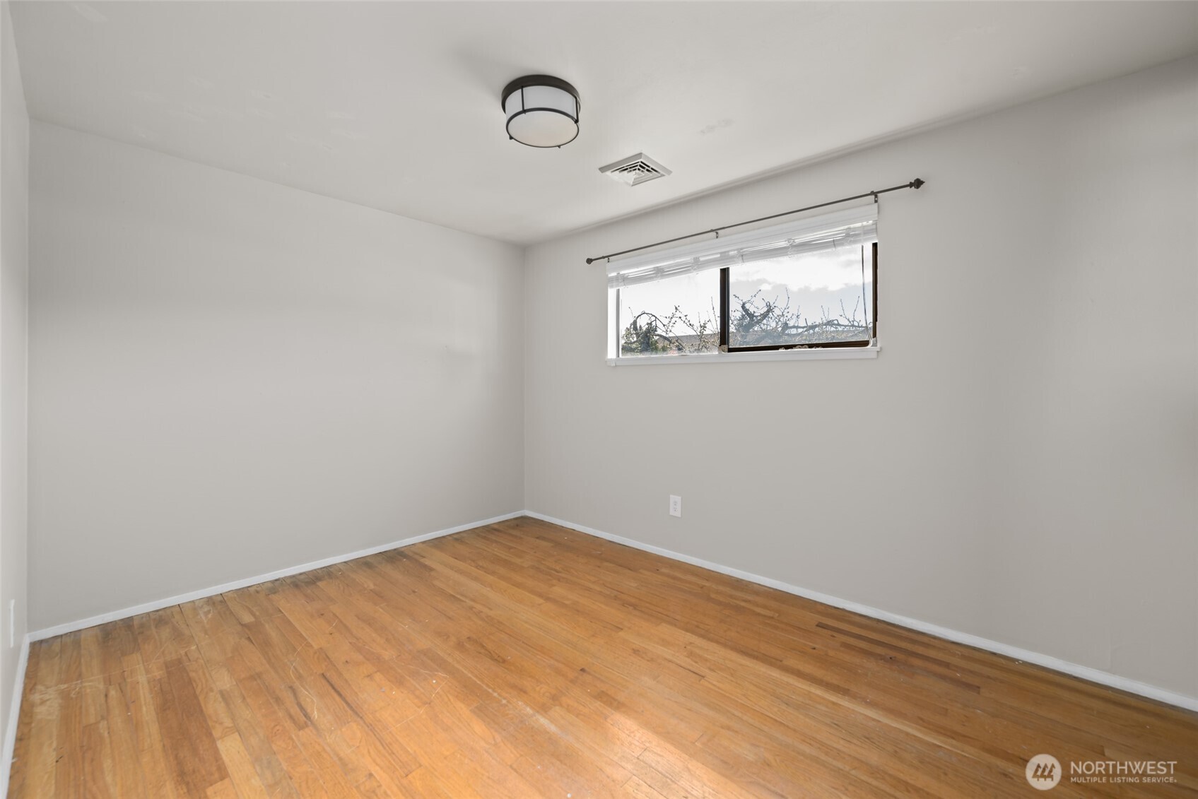 1805 37th Street Anacortes, WA 98221 - Photo 21 of 40 a view of a room with a wooden wall