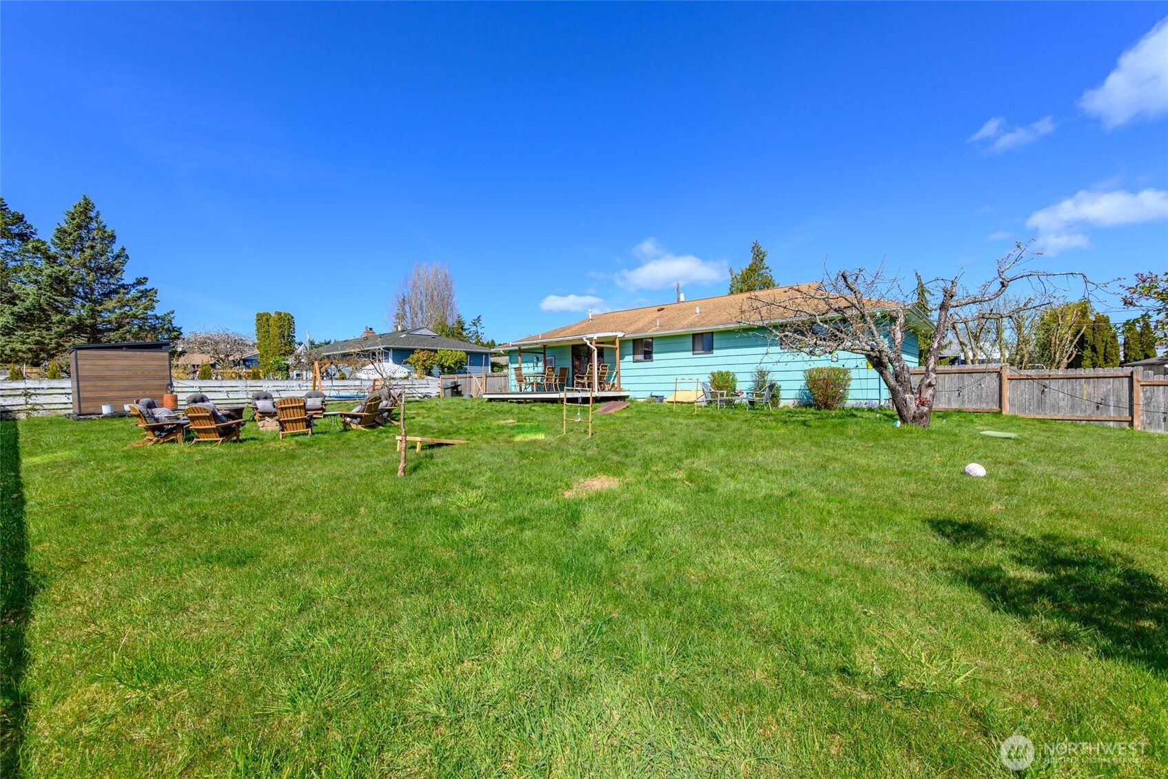 1805 37th Street Anacortes, WA 98221 - Photo 24 of 40 a view of a house with a yard porch and sitting area