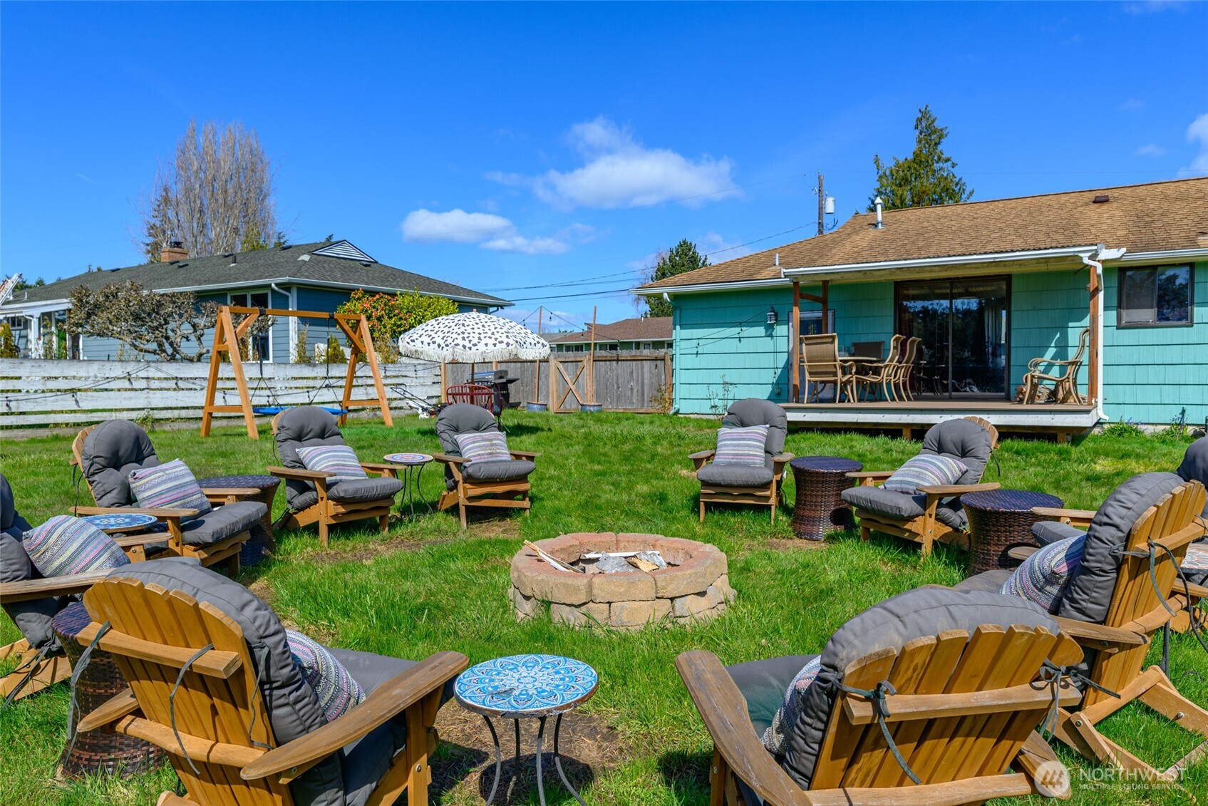 1805 37th Street Anacortes, WA 98221 - Photo 29 of 40 a view of a house with backyard porch and sitting area