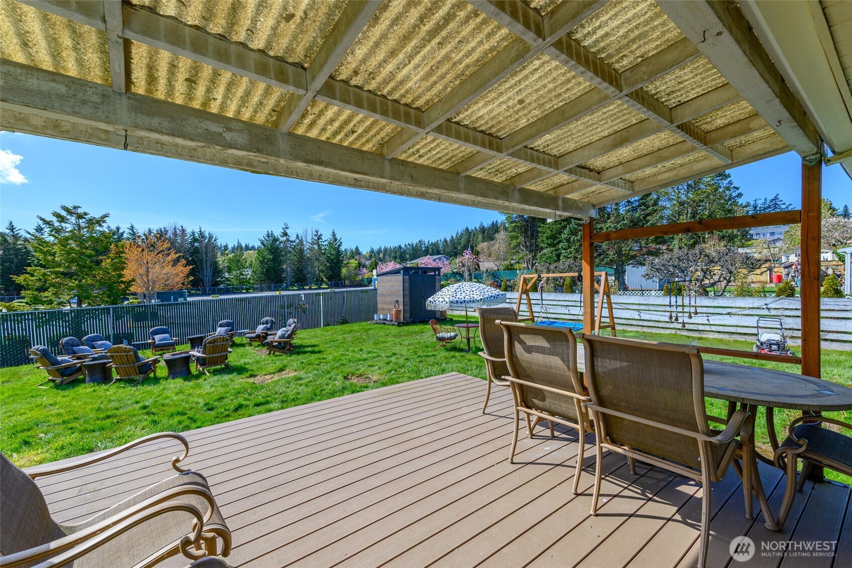 1805 37th Street Anacortes, WA 98221 - Photo 35 of 40 a view of a patio with a table chairs and a patio