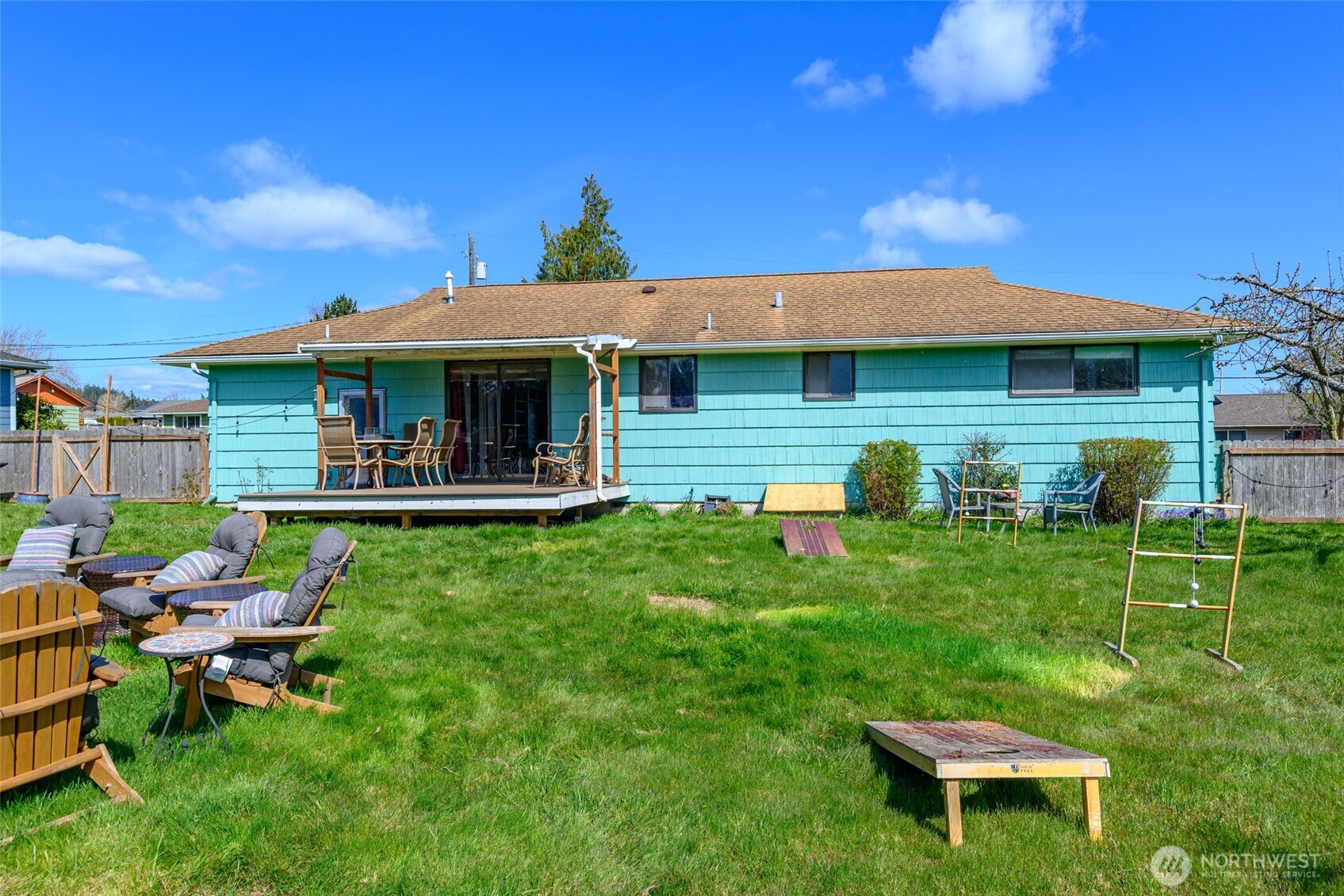 1805 37th Street Anacortes, WA 98221 - Photo 36 of 40 a front view of a house with a yard