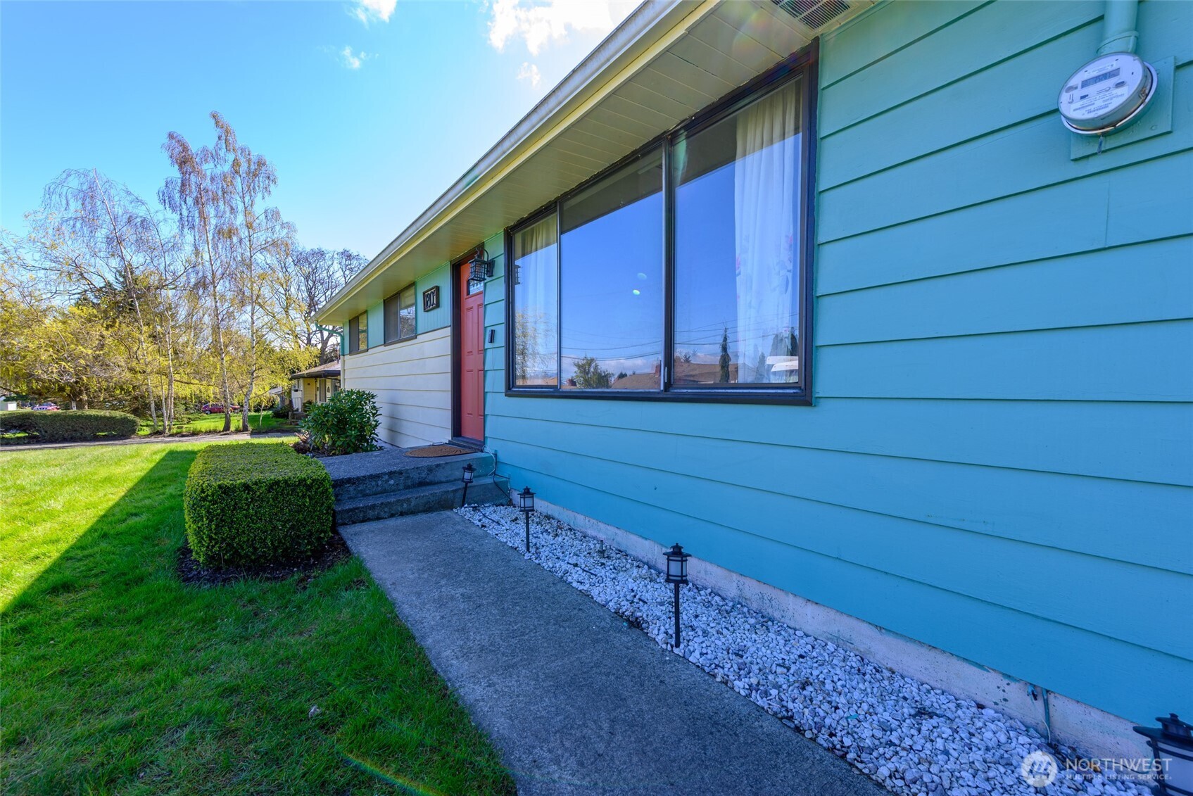 1805 37th Street Anacortes, WA 98221 - Photo 5 of 40 a view of a house with backyard and garden