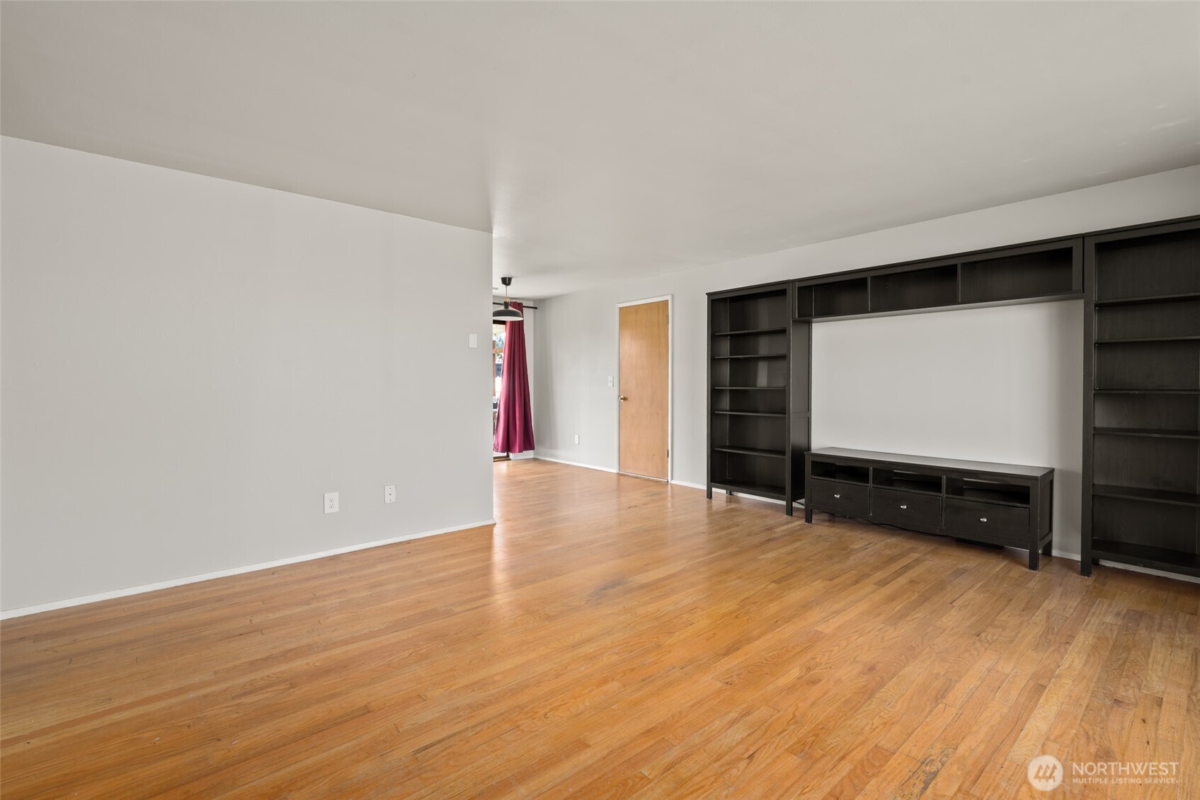 1805 37th Street Anacortes, WA 98221 - Photo 8 of 40 a view of empty room with wooden floor