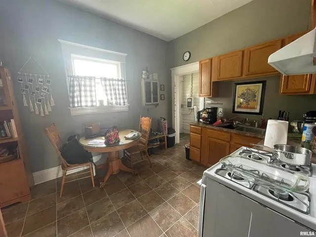 a bathroom with a toilet and a sink
