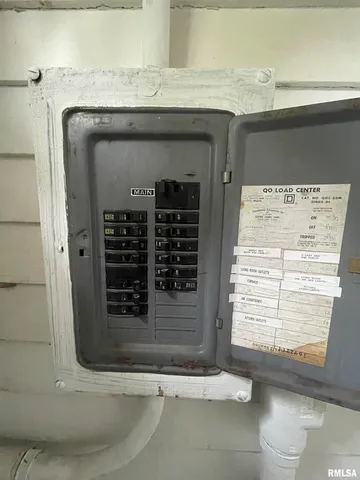 a bathroom with a sink mirror and vanity