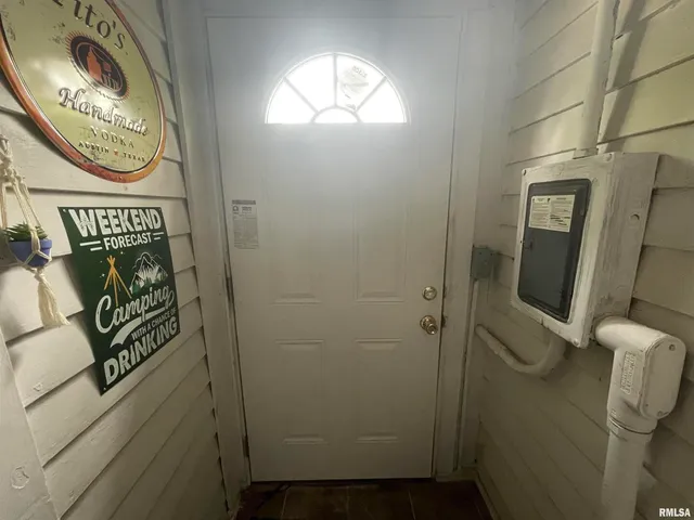 a bathroom with a tub and shower