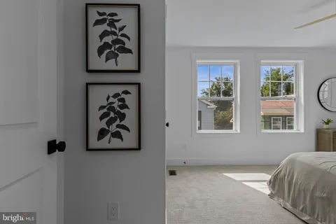 an aerial view of multiple house with outdoor space