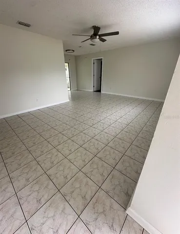 a view of a livingroom with an entryway