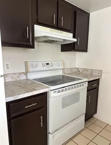 a view of a kitchen with sink