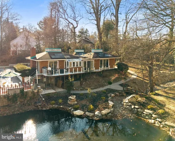 a view of a lake with a house