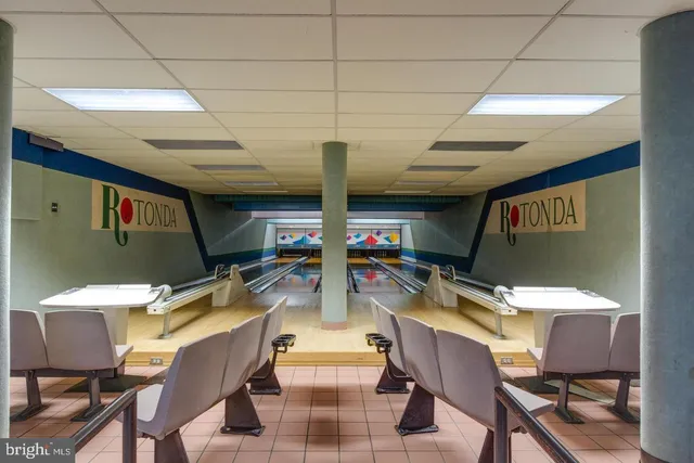 a lobby with furniture and window