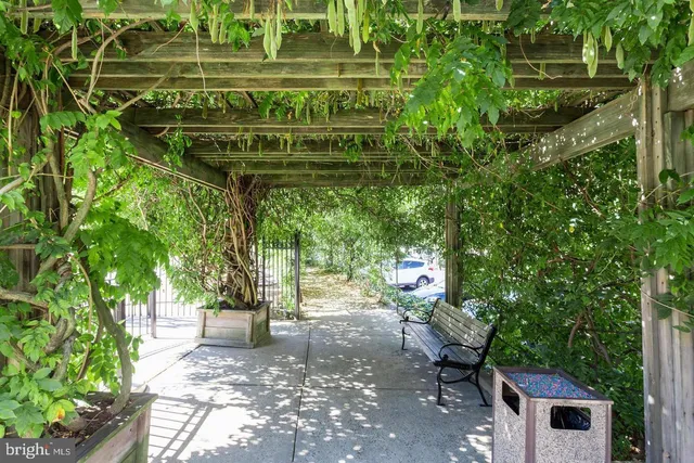a garden view with a sitting space