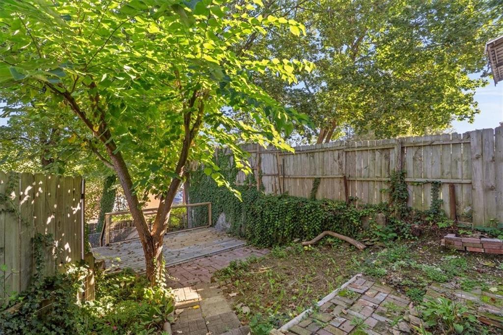 831 Malvern Road Pittsburgh, PA 15202 - Photo 25 of 33 a backyard of a house with lots of green space