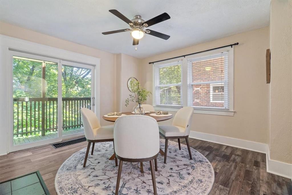 831 Malvern Road Pittsburgh, PA 15202 - Photo 8 of 33 a view of a dining room with furniture window and wooden floor