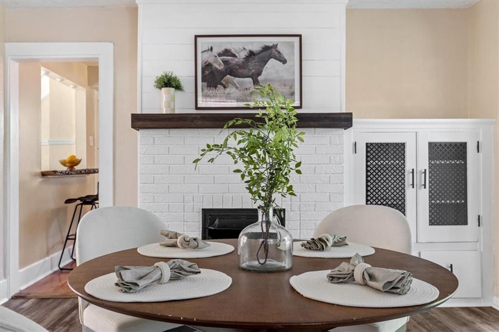 831 Malvern Road Pittsburgh, PA 15202 - Photo 10 of 33 a dining room with furniture and a mirror