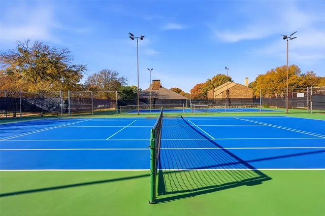 a view of a street with houses