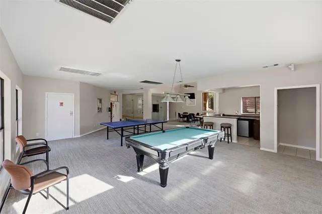 a view of a house with swimming pool