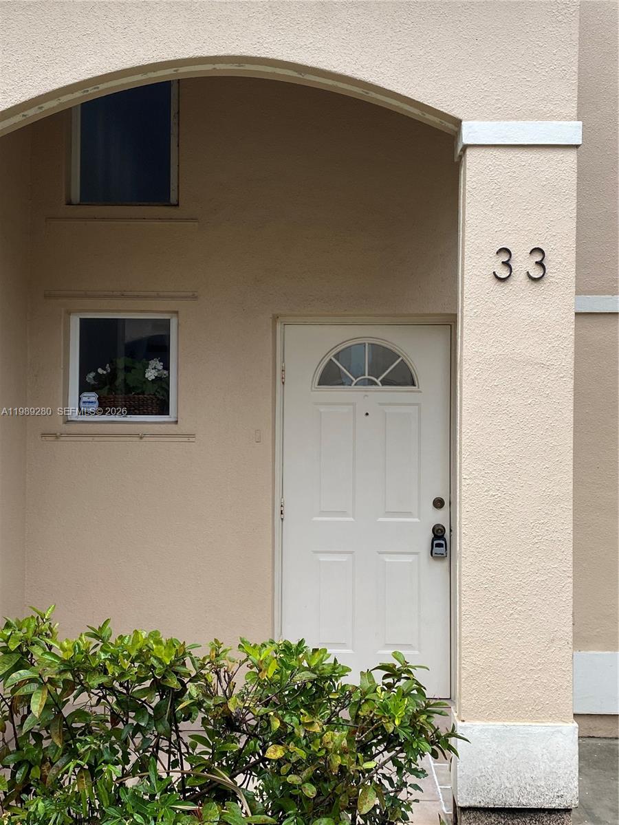 543 Racquet Club Road, Unit 33 Weston, FL 33326 - Photo 2 of 28 a view of front door