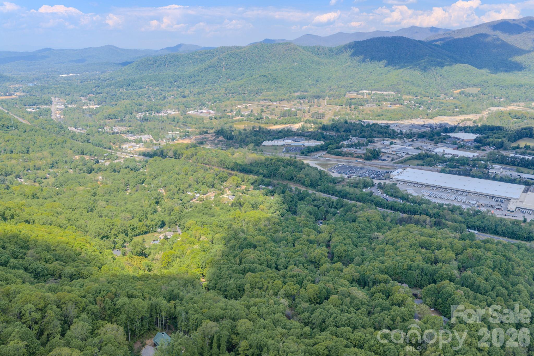 263 Mockingbird Road, Unit 2 Swannanoa, NC 28778 - Photo 5 of 22 a view of lake with mountain