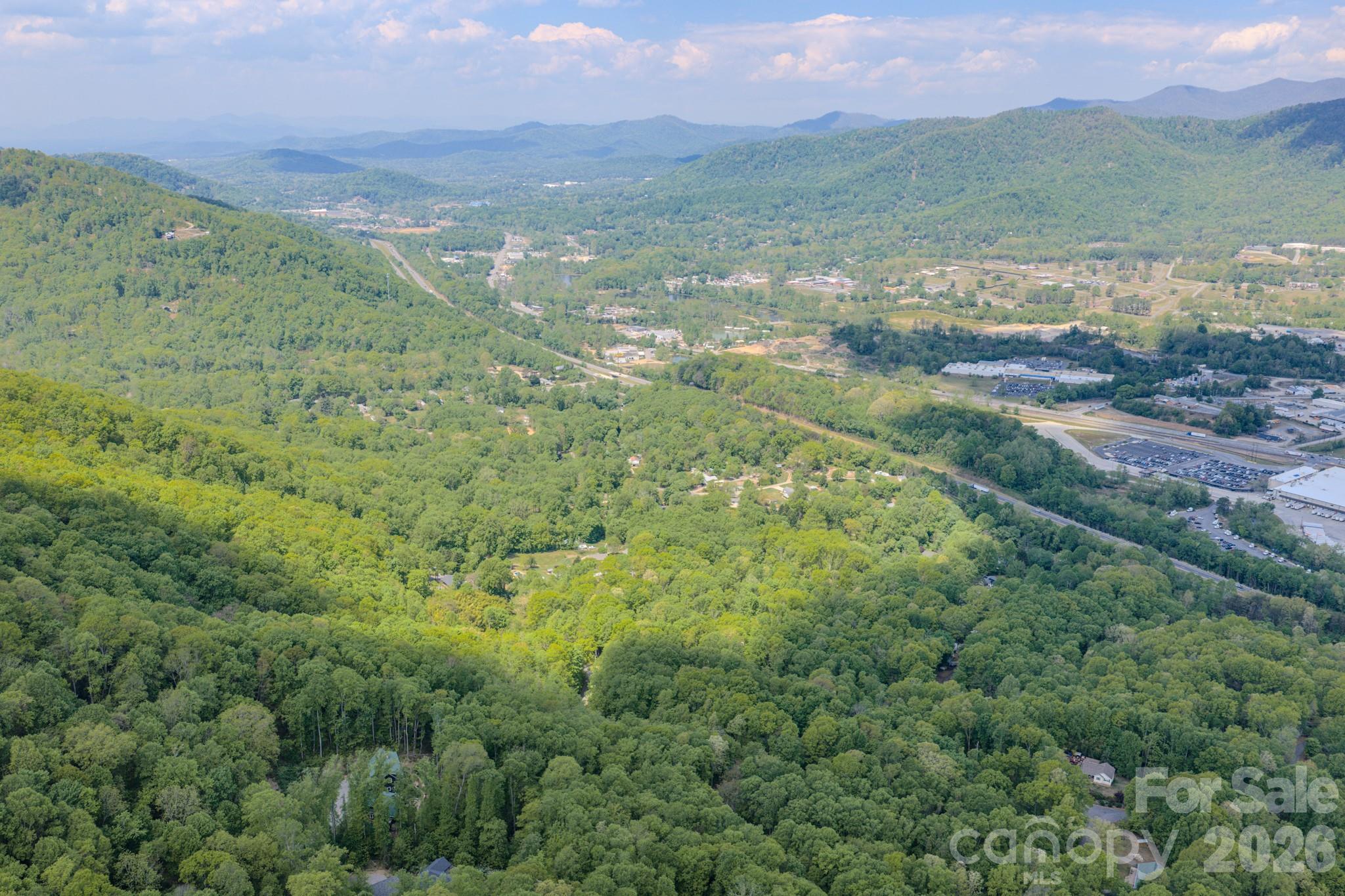 263 Mockingbird Road, Unit 2 Swannanoa, NC 28778 - Photo 6 of 22 a view of lake with mountain