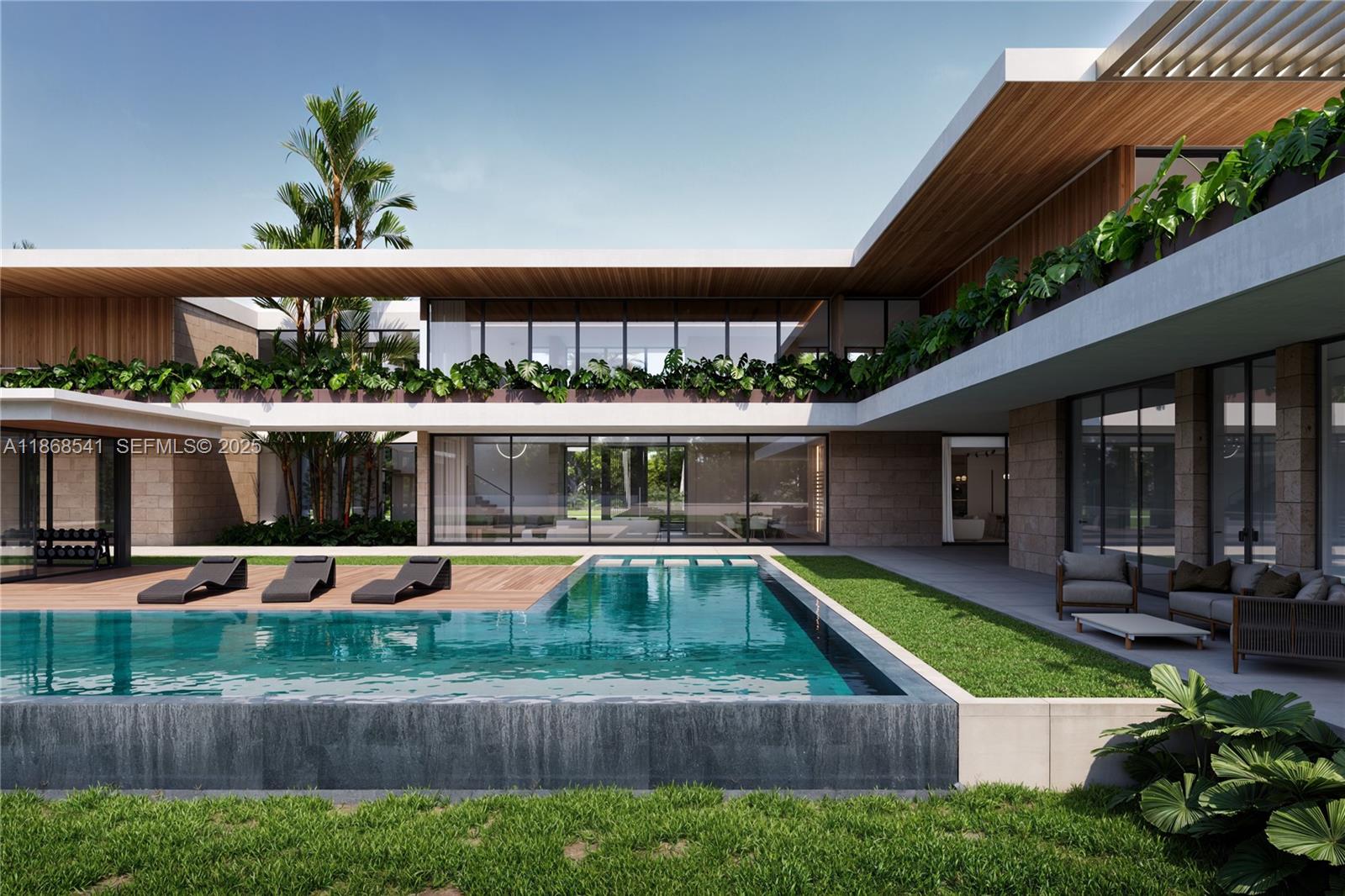 18105 Southwest 158th Street Miami, FL 33187 - Photo 16 of 19 swimming pool view with a seating space and a garden view