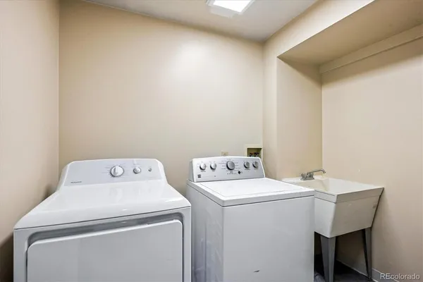 a utility room with dryer and washer