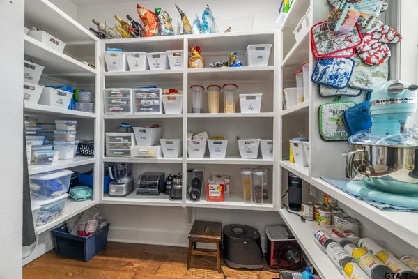 a room with storage and utility