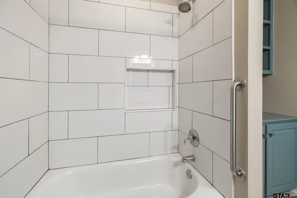 a bathroom with a bathtub