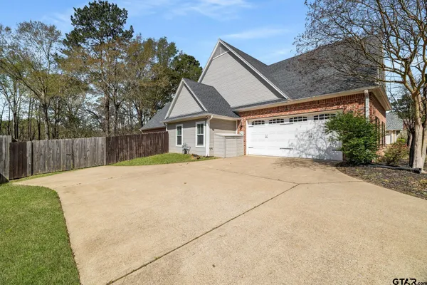 a front view of house with yard and seating
