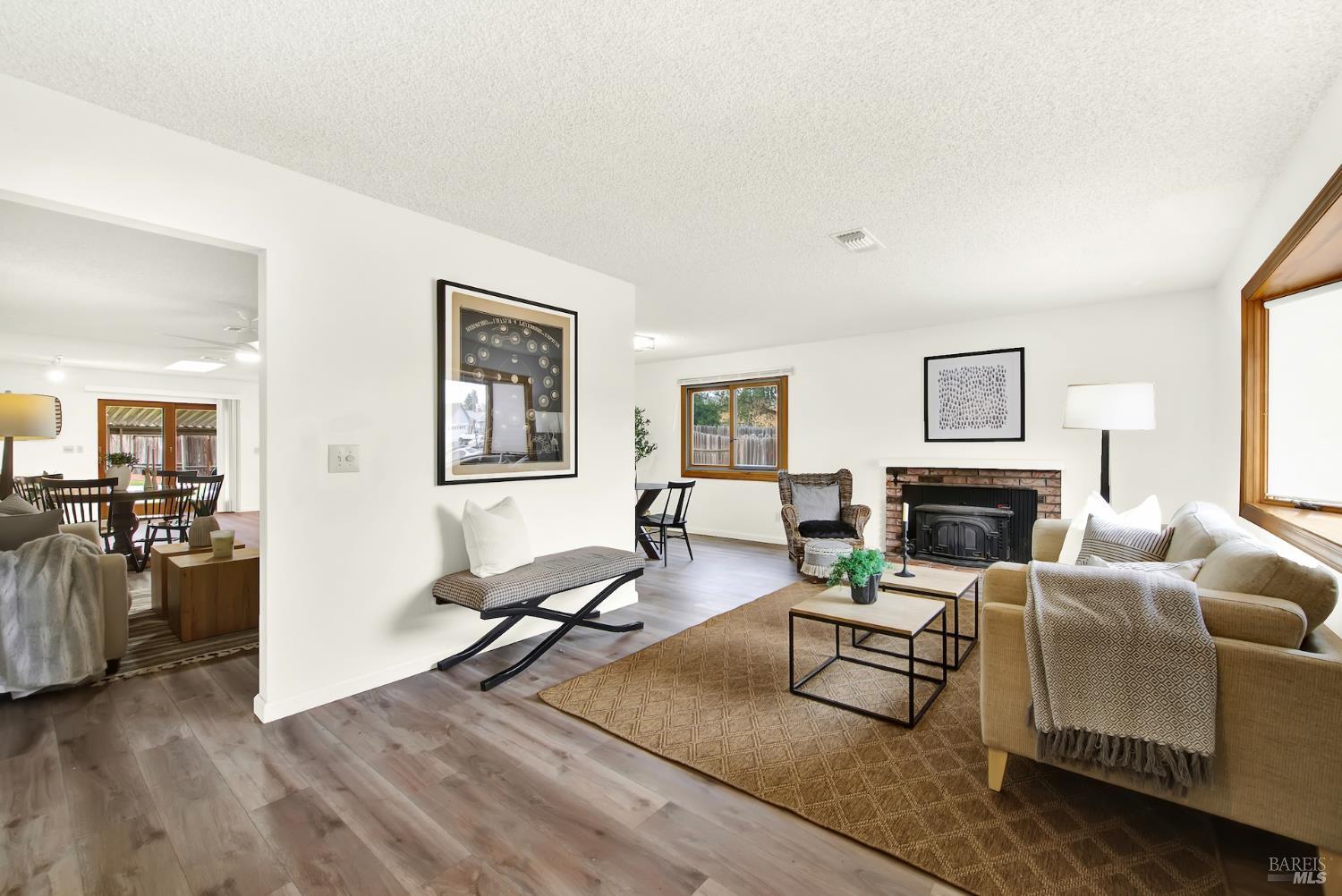 2219 Channing Court Fairfield, CA 94533 - Photo 12 of 81 a living room with furniture or couch and a fireplace