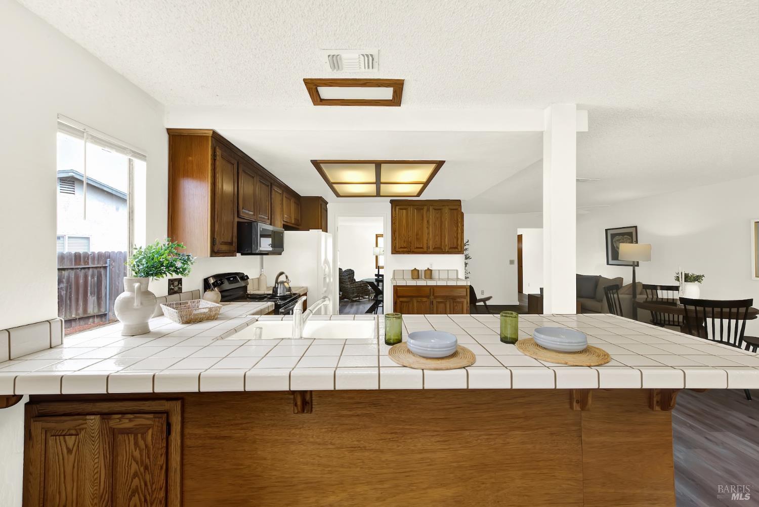 2219 Channing Court Fairfield, CA 94533 - Photo 31 of 81 a living room with furniture and a large window