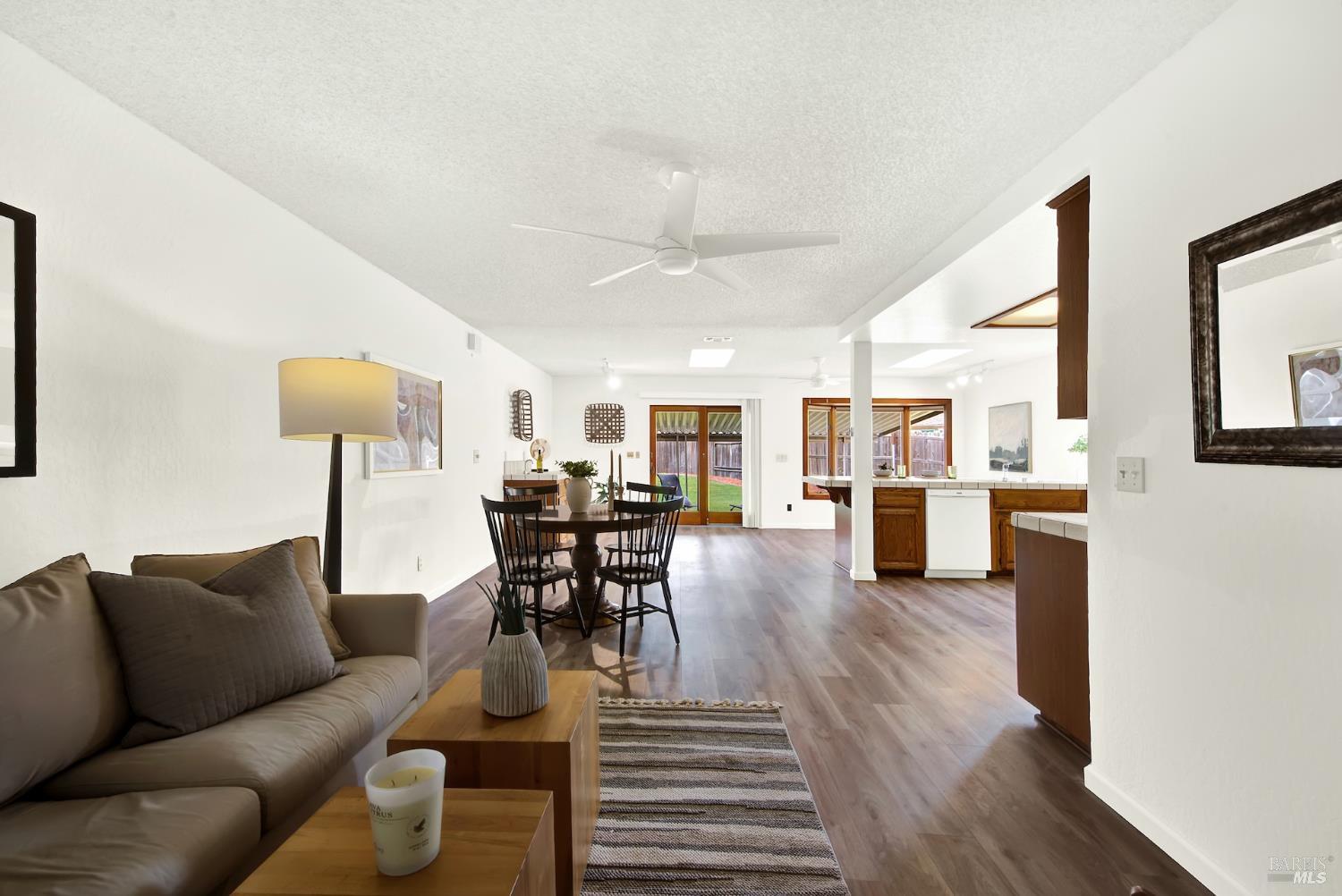 2219 Channing Court Fairfield, CA 94533 - Photo 41 of 81 a living room with furniture and a wooden floor