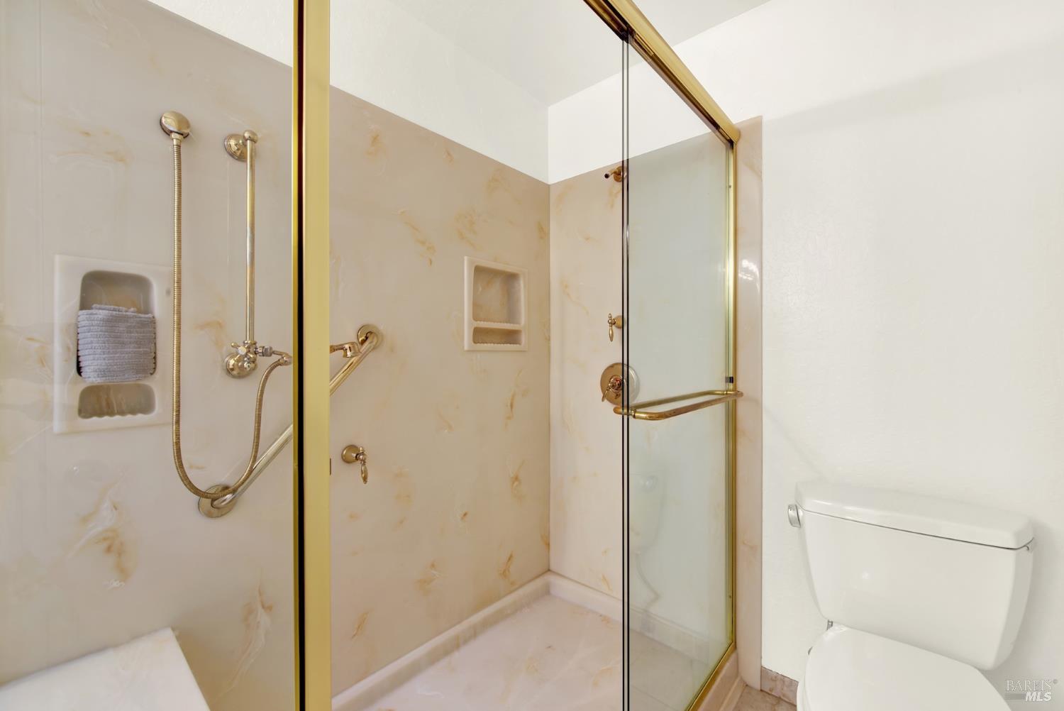 2219 Channing Court Fairfield, CA 94533 - Photo 59 of 81 a bathroom that has a glass shower door