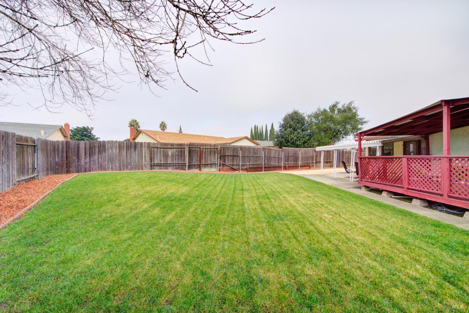 2219 Channing Court Fairfield, CA 94533 - Photo 76 of 81 a view of yard with green space and wooden fence