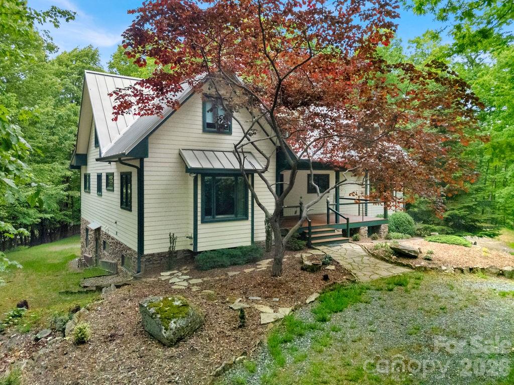 40 Walnut Ridge Road Brevard, NC 28712 - Photo 2 of 47 a view of a house with a yard