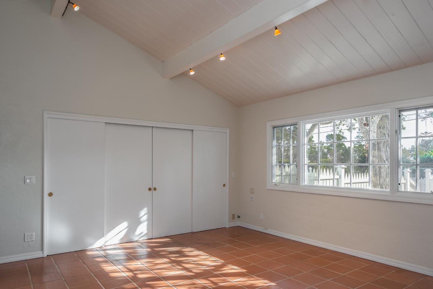 3961 Ronda Road Pebble Beach, CA 93953 - Photo 11 of 15 a view of an empty room with a window