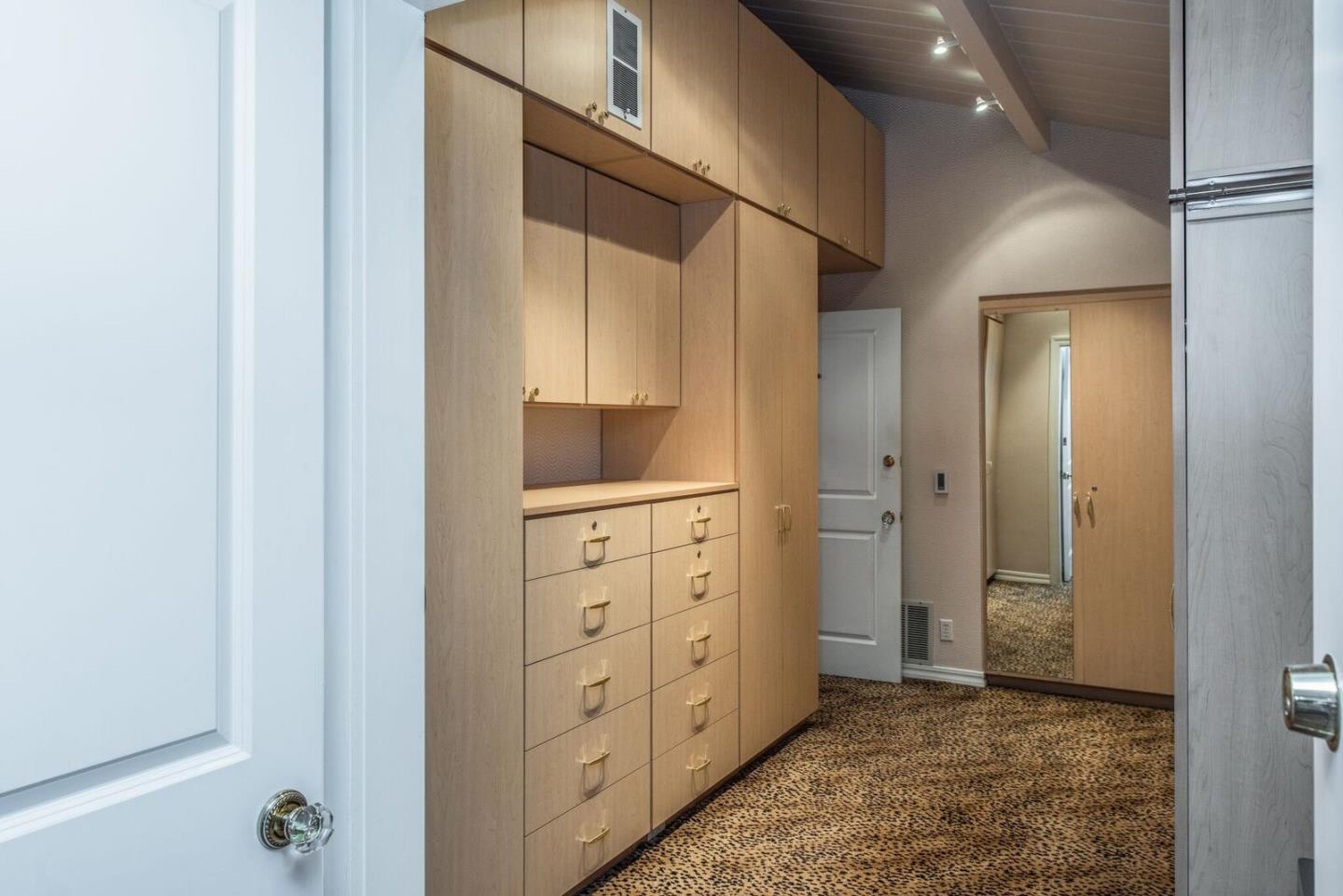 3961 Ronda Road Pebble Beach, CA 93953 - Photo 14 of 15 a view of hallway with cabinets