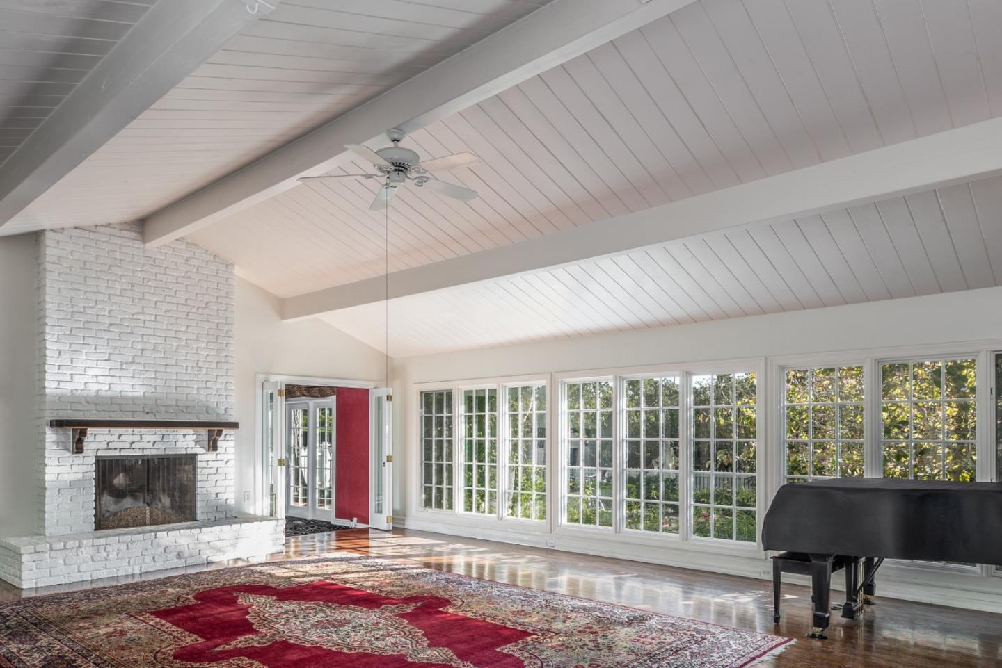3961 Ronda Road Pebble Beach, CA 93953 - Photo 8 of 15 a living room with furniture and a fireplace
