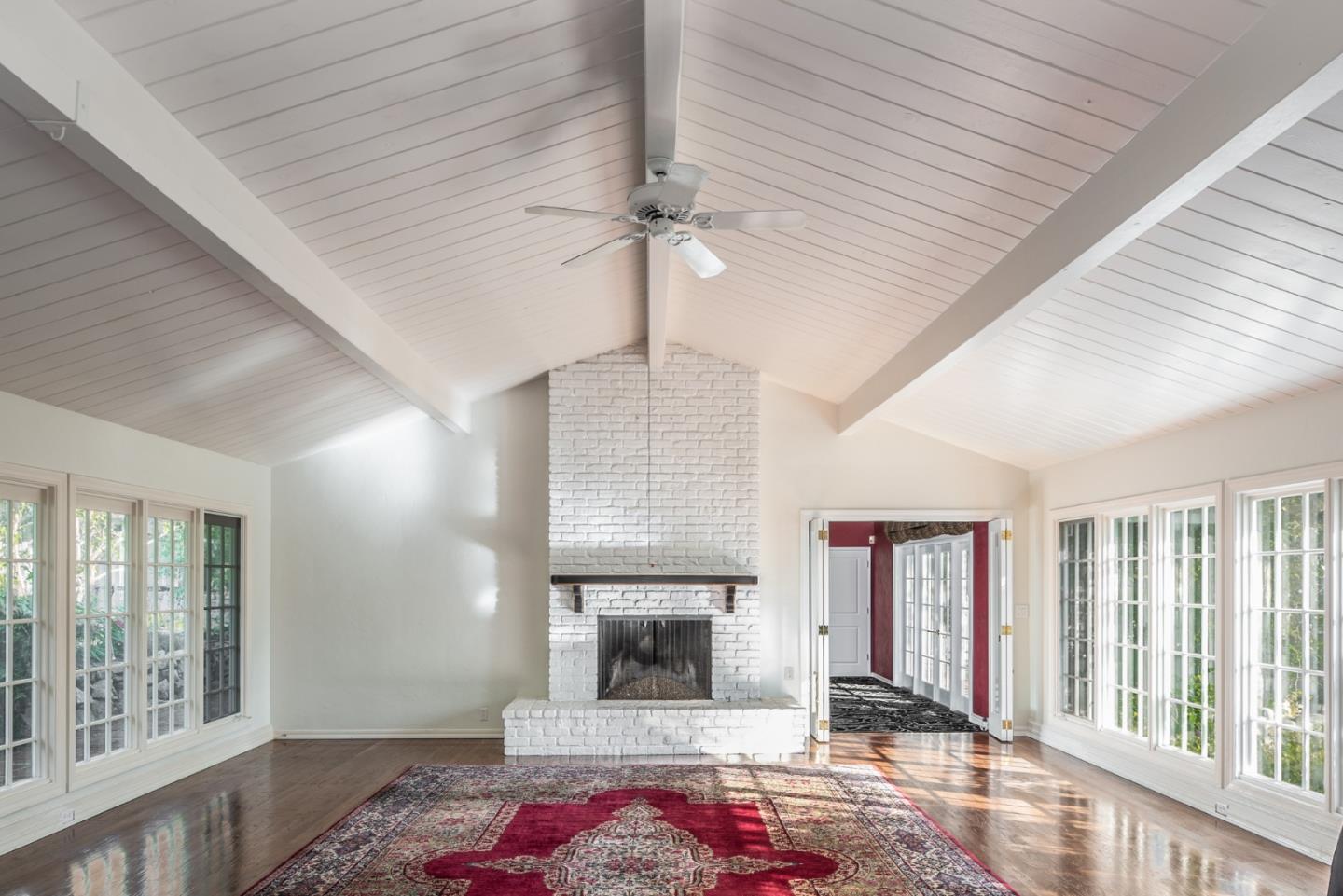 3961 Ronda Road Pebble Beach, CA 93953 - Photo 9 of 15 a living room with furniture and a fireplace