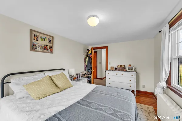 a kitchen with granite countertop a sink and cabinets