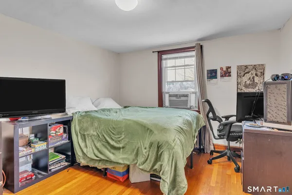 a en suite bathroom with a sink mirror and vanity