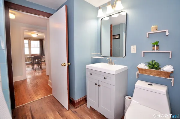 a swimming pool with trees in the background